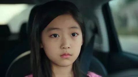 AI Video from prompt: "Extreme cinematic close-up of an Asian girl, ea