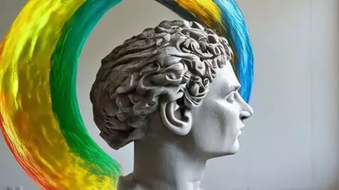 AI Video from prompt: A huge grey marble statue of a humam head slowly