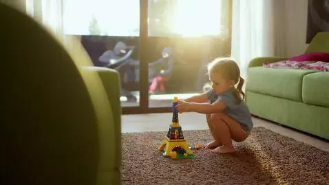 AI Video from prompt: Long shot of a young four year old girl that sit