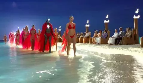 AI Video from prompt: A hyper-realistic, cinematic beach scene at gold