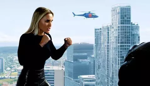 Create a closeup battle of a strong female spy w