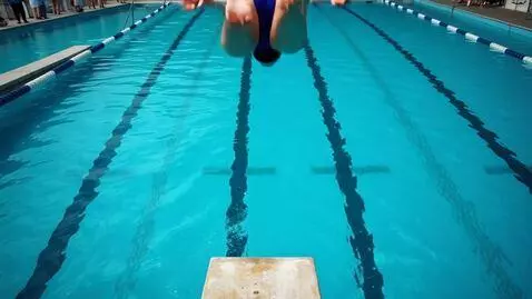 AI Video from prompt: POV of an olympic high diver diving off a diving