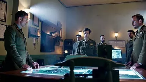 AI Video from prompt: “1940s U.S. military command outpost at night. T