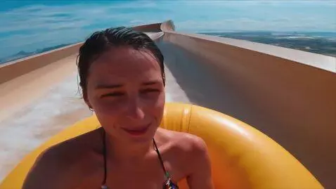 AI Video from prompt: upper body closeup of a bare chested adorable wo