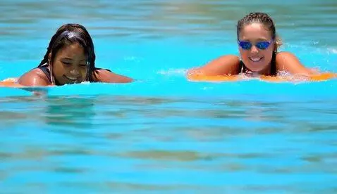 AI Video from prompt: 2 college girls tubing on the Salt River in Ariz