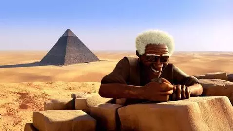 "An elderly, dark-skinned man with white hair is