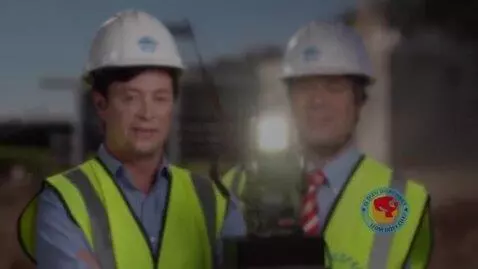 AI Video from prompt: A confident construction engineer wearing a whit