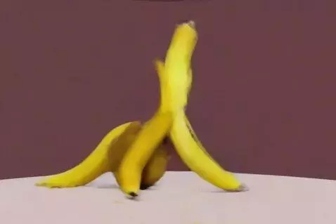 AI Video from prompt: A banana split dancing and doing splits on a sta