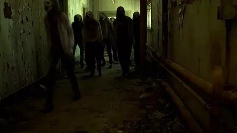 AI Video from prompt: A group of zombies are in a rundown corridor of 