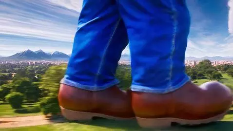 AI Video from prompt: 3600ft sized Giant Mario walking in workboots sf