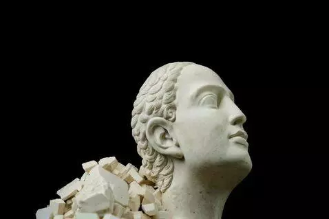 AI Video from prompt: "ancient Greek marble statue head falling, slow 
