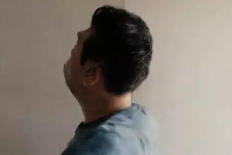 AI Video from prompt: The room starts spinning and the man who was sit