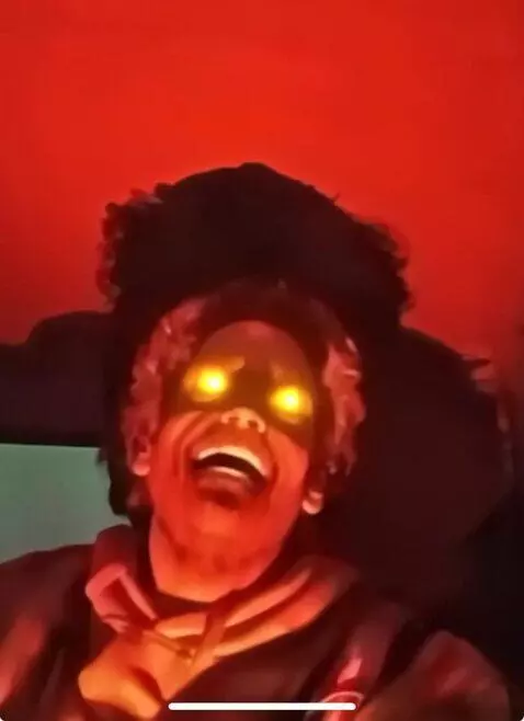 AI Video from prompt: His eyes glow yellow and a golden flame erupts f