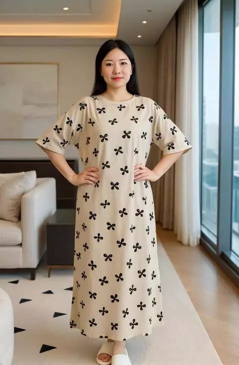 AI Video from prompt: A poised woman stands in a stylish, modern apart