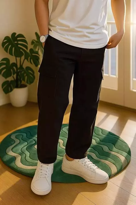 AI Video from prompt: A young man stands confidently indoors, wearing 