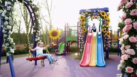AI Video from prompt: "Vibrant playground overflowing with blooming fl