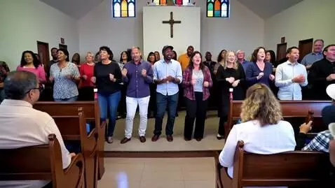AI Video from prompt: People singing a gospel song and dancing at the 