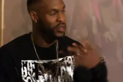 AI Video from prompt: kanye west smiles and says: yo alexander my man,