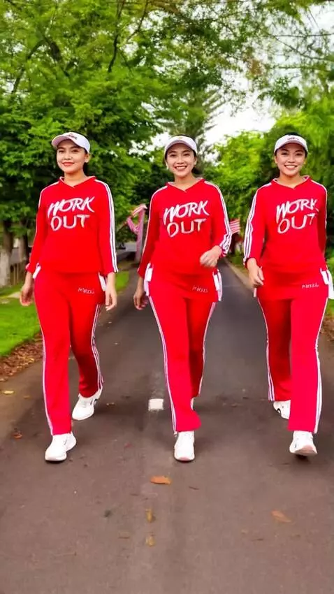 AI Video from prompt: Ke 3 model bergerak maju kedepan sambil tersenyu