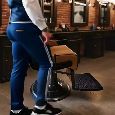 AI Video from prompt: A heavily bearded man in a tracksuit slowly walk
