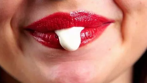 AI Video from prompt: A beautiful young woman , close up, super shiny 