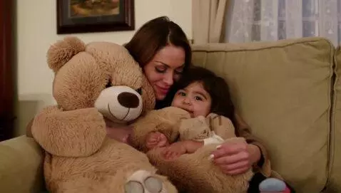 AI Video from prompt: A teddy bear mother consoling her teddy bear chi