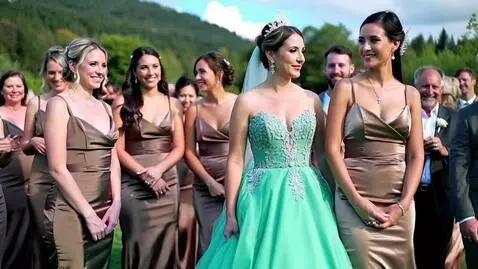 AI Video from prompt: A bride in her emerald green princess gown  with