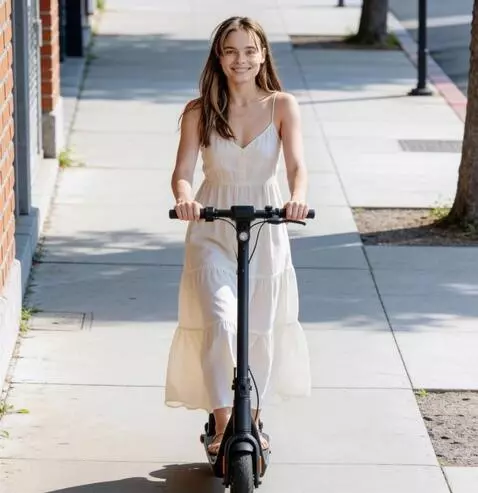AI Video from prompt: a girl riding towards me on a scooter. she,s in 