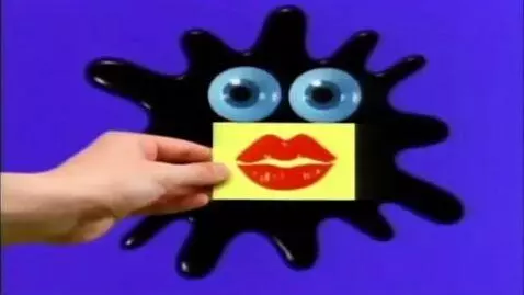 AI Video from prompt: Over a static light violet background, a black i