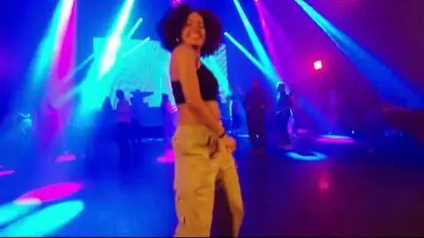 AI Video from prompt: a first person video. a woman in a dance club, h