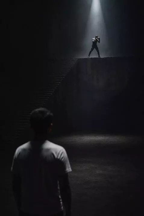 AI Video from prompt: Static locked camera. The boxer on the platform 