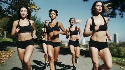 AI Video from prompt: many female joggers with bouncing body parts, wh