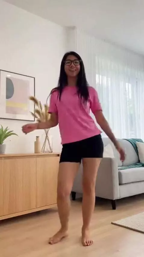 AI Video from prompt: A skinny 198yo brazilian girl, pink t-shirt than