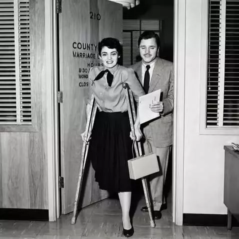 AI Video from prompt: A one-legged woman walks unhurriedly toward the 