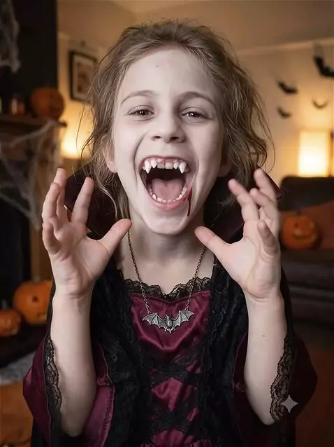 AI Video from prompt: She is a vampire for Halloween I want her to do 