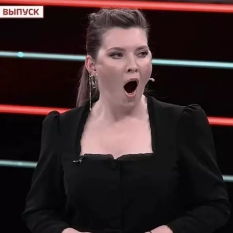 AI Video from prompt: The girl opens her mouth wide and vibrates the t