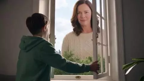 AI Video from prompt: Opening up a window and seeing their 50ft mother