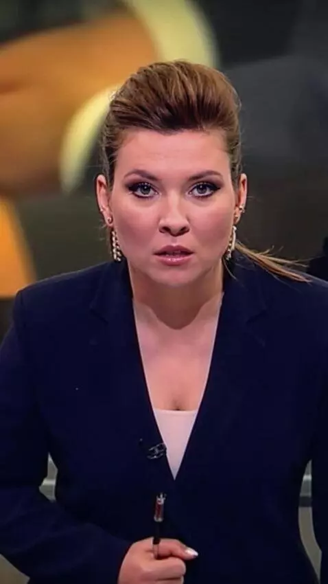 AI Video from prompt: The woman leans close to the camera and vibrates
