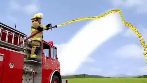 AI Video from prompt: A dwarf arrives on a fire truck. He sprays a rai