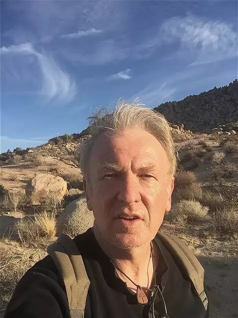 AI Video from prompt: the shows host introduces himself from an outdoo