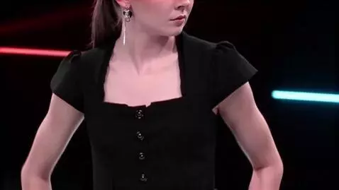 AI Video from prompt: A girl adjusts her tights under her dress