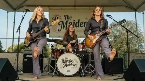 AI Video from prompt: 3 smiling young woman, barefoot with slightly di