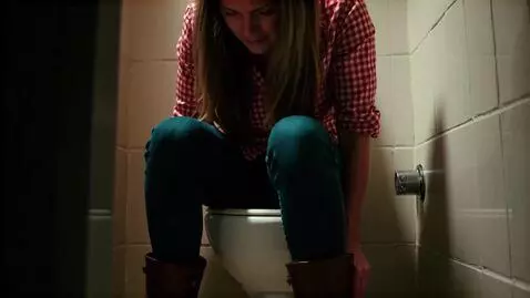 AI Video from prompt: CowGirl has diarrhea on the toilet
