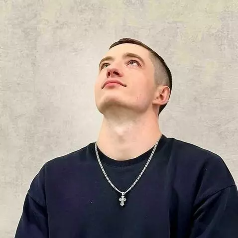 AI Video from prompt: The man arches sharply backward, throws his head