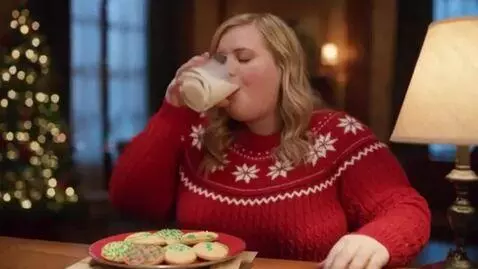 AI Video from prompt: A short film of Mrs Claus who is a 30 year old b