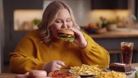 AI Video from prompt: Blonde Caucasian female enjoys being fat she can