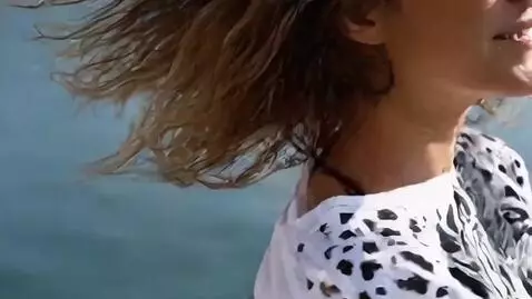 AI Video from prompt: A girl in a short tutu skirt turns around, does 