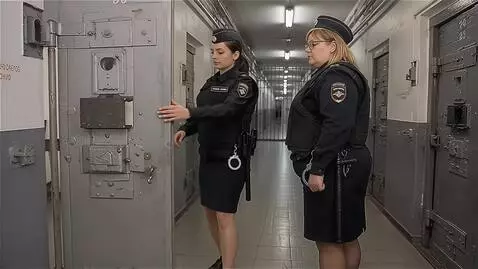 AI Video from prompt: Russia, a prison corridor. To the left and right