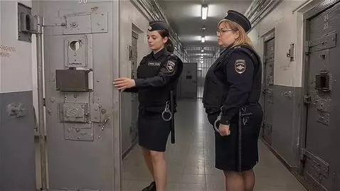 AI Video from prompt: Russia, a prison corridor. To the left and right