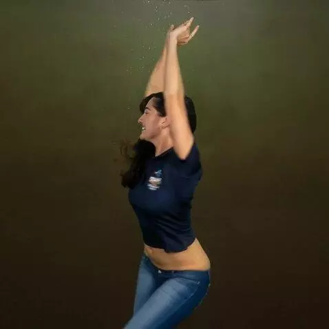 AI Video from prompt: A joyful woman with a thick, fit body dances wit